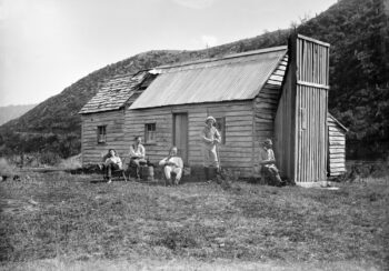 Trout fishing party at Smith's Whare in the Waterworks Valley, Wainuiomata. Halse, Frederick James, 1863-1936 : Collection of negatives. Ref: 1/2-004086-G. Alexander Turnbull Library, Wellington, New Zealand. /records/22822206 - Edited by Lance Stewart