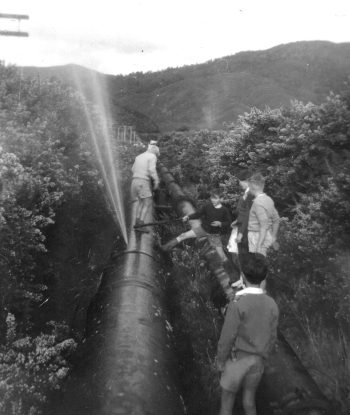 Leaky 30 inch pipe next to the Orongorongo pipe at Richard Prouse Park - c1960s