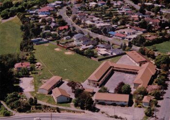 Wainuiomata Primary School Buildings & School House to the left - 1987 - WHMS: B432
