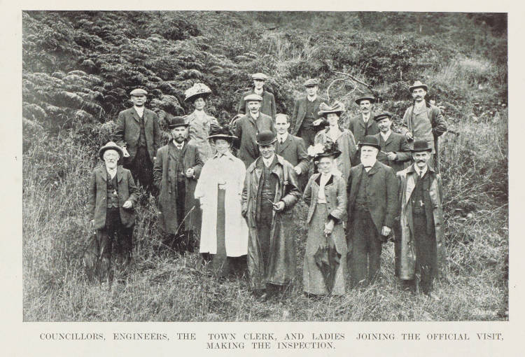 Councillors, engineers, the town clerk, and ladies joining the official visit, making the inspection - Photographer: New Zealand Graphic; Schaef, Arthur Waldemar, 1867-1940; Sarony Studio (Wellington) - Date of Image 1908-03-14 - Please acknowledge Auckland Libraries Heritage Collections NZG-19080314-0023-01