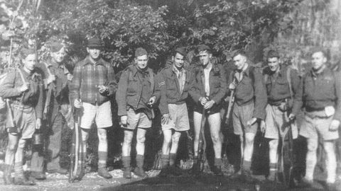 Some of the Bush Guide Platoon at Orongorongo tunnel mouth - L-R Sid Harris, Charlie Woods, Flick Everette, Eric Hambleton, George Thompson, Graeme Eaton, Jack Logie, Jim Forsythe, Tom Messer - laser - ex Graeme Eaton, Greytown - c1940 - WHMS: P1561