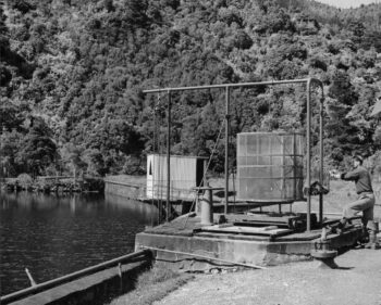 Filter at the low dam in 1958, Wainuiomata Reservoir, Wellington region. New Zealand Free Lance : Photographic prints and negatives. Ref: PAColl-8983-27. Alexander Turnbull Library, Wellington, New Zealand. /records/22413169