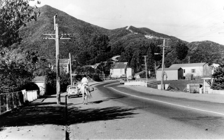 Main Road in 1970 with old school building (left), old Public Hall (centre), fire engine garage & Riverside Hall (right) - WHMS: L3034