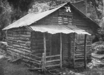 Old log cabin located in Catchpool Valley - circa 1960s. Credit: Carl Smith