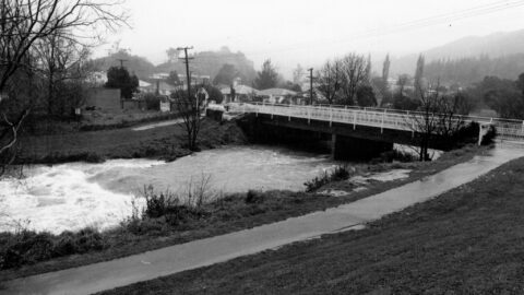 Flooded Wainuiomata River & Main Road Bridge - 28 July 1985 - © Wainuiomata Historical Museum