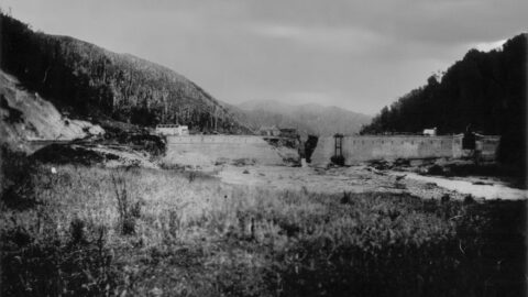 Wainuiomata Dam Damage and Dam Worker Huts in 1884 -Source: Wainuiomata Historic Museum Society (L3591).