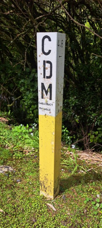 Road marker roughly indicates the location of the Venturi Meter House - 2025 - © wainuiomata.net