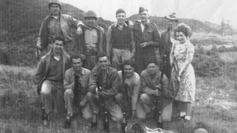 Group of American G.I.'s and local lads plus Maisie Burt at Wainuiomata for a pig hunt - ex Les Dalton c1944 - WHMS: P1509