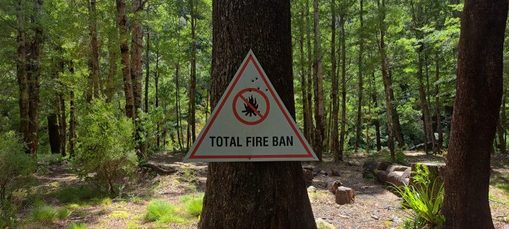 Old Fire Ban sign at abandoned Grace's Stream Campsite in Wainuiomata - 2025 - © wainuiomata.net